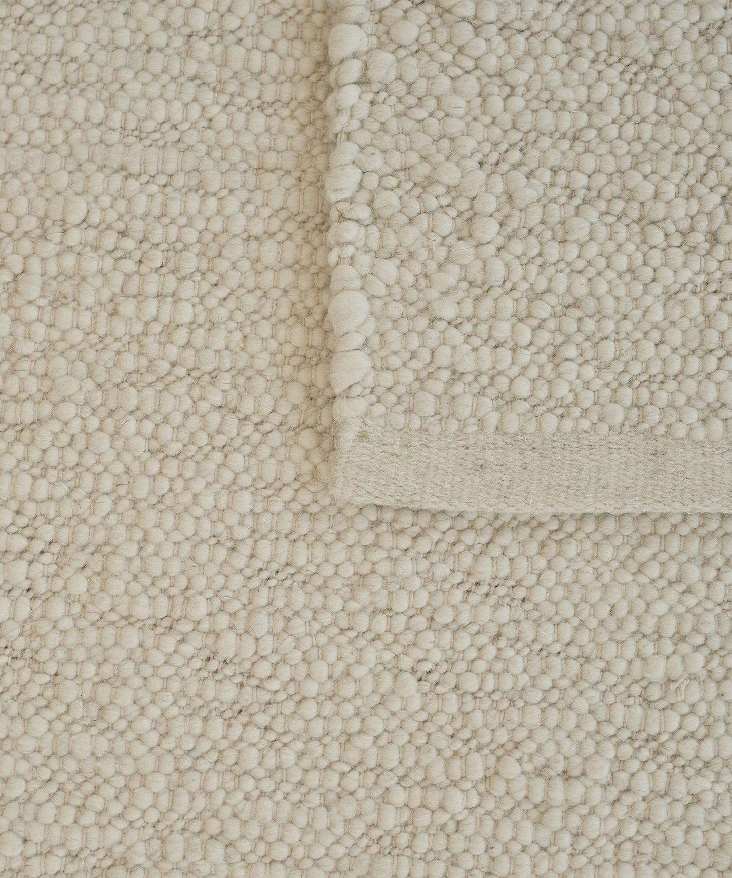 Pebbled Poem Rug in White