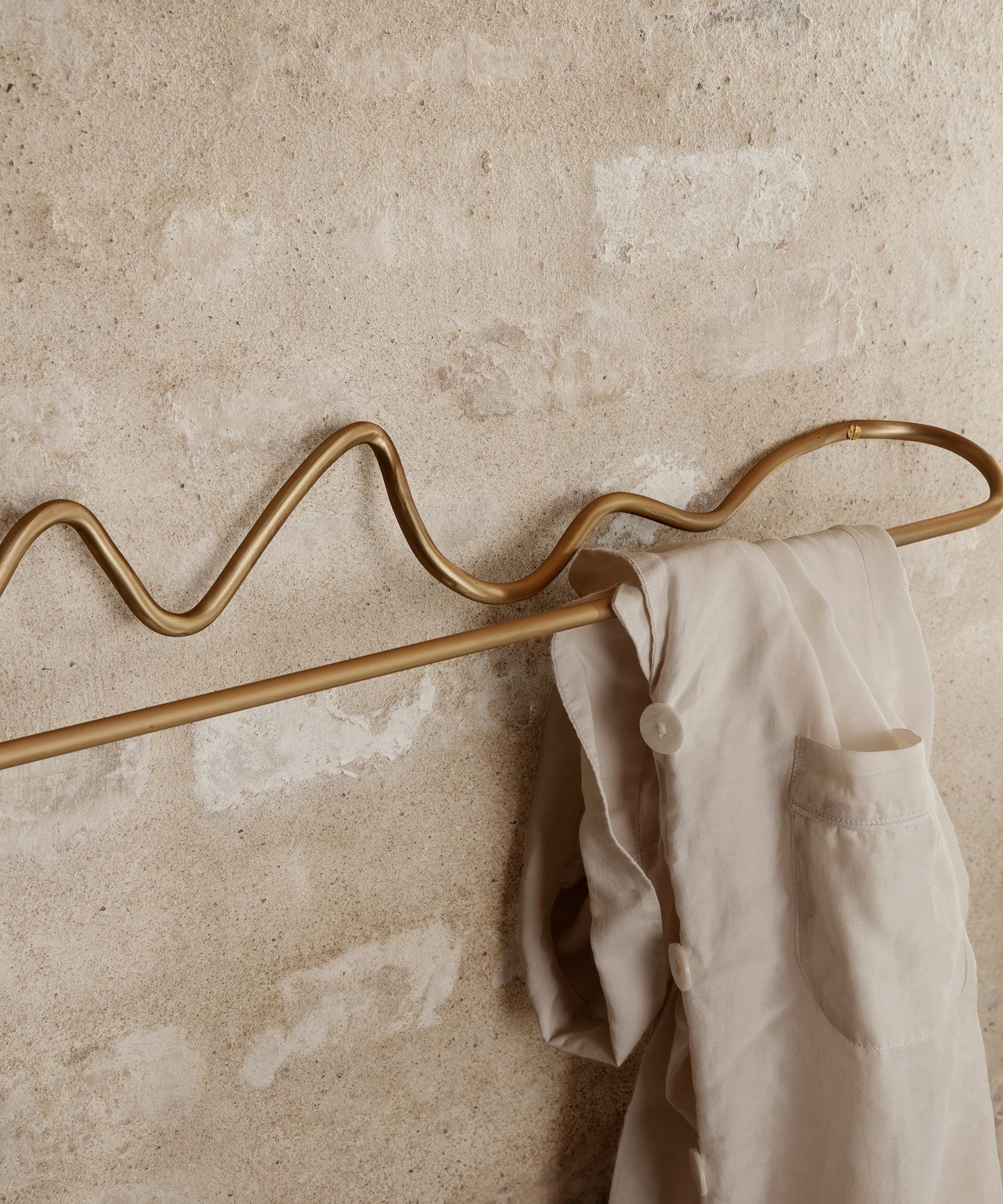 Curvature Towel Hanger