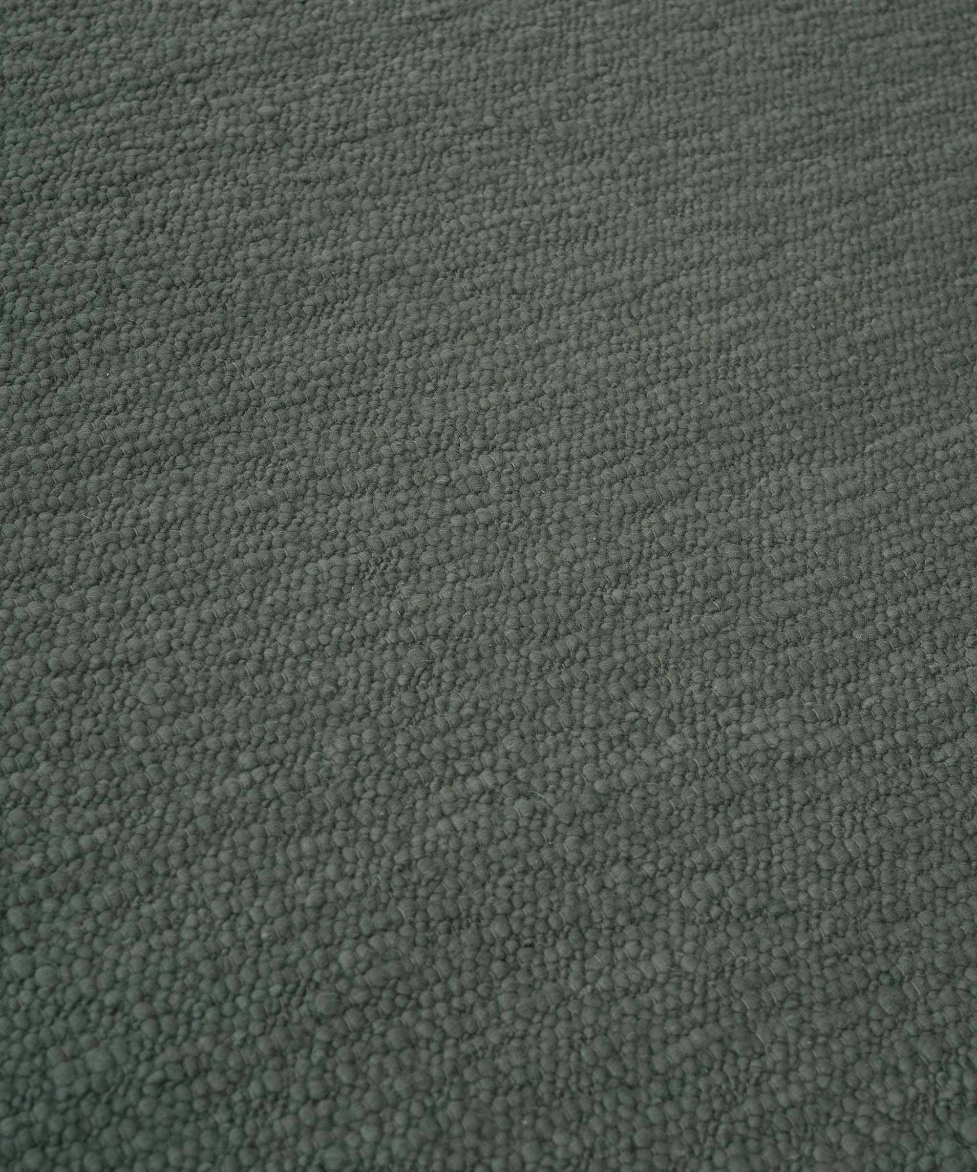 Pebbled Poem Rug in Moss