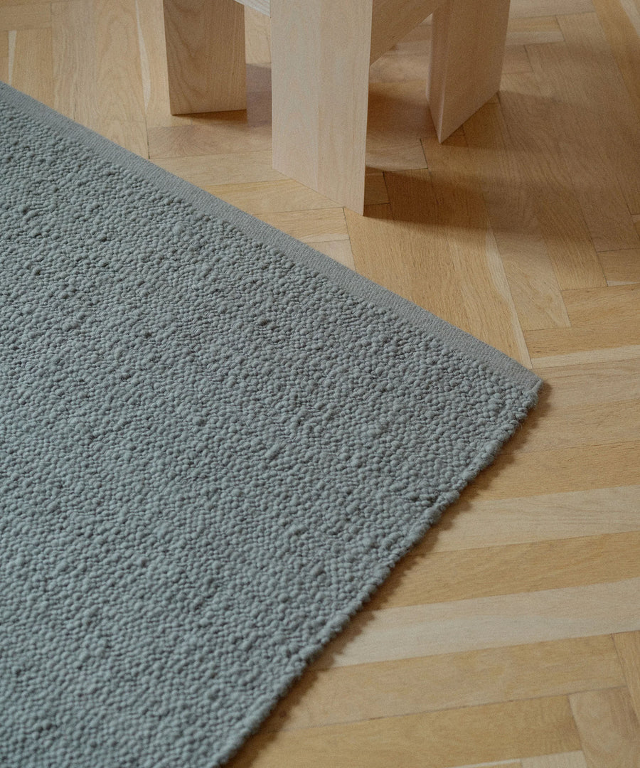 Pebbled Poem Rug in Moss