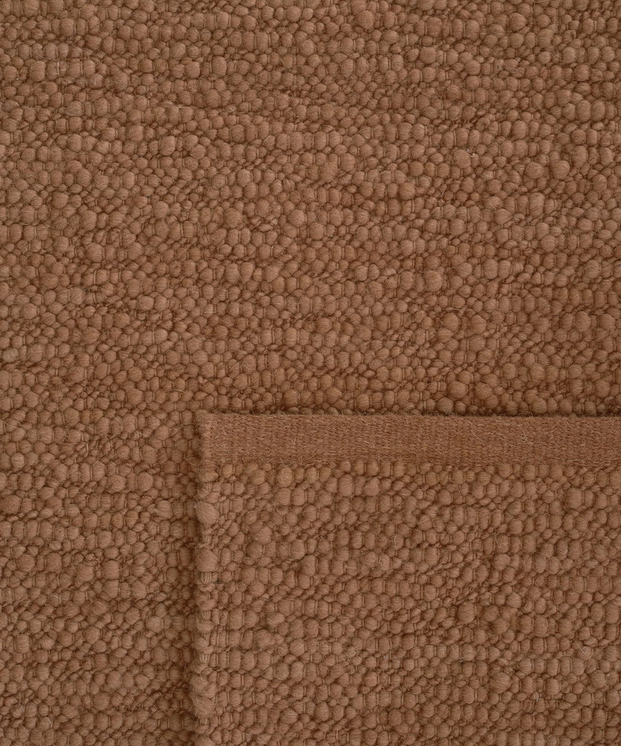 Pebbled Poem Rug in Terracotta