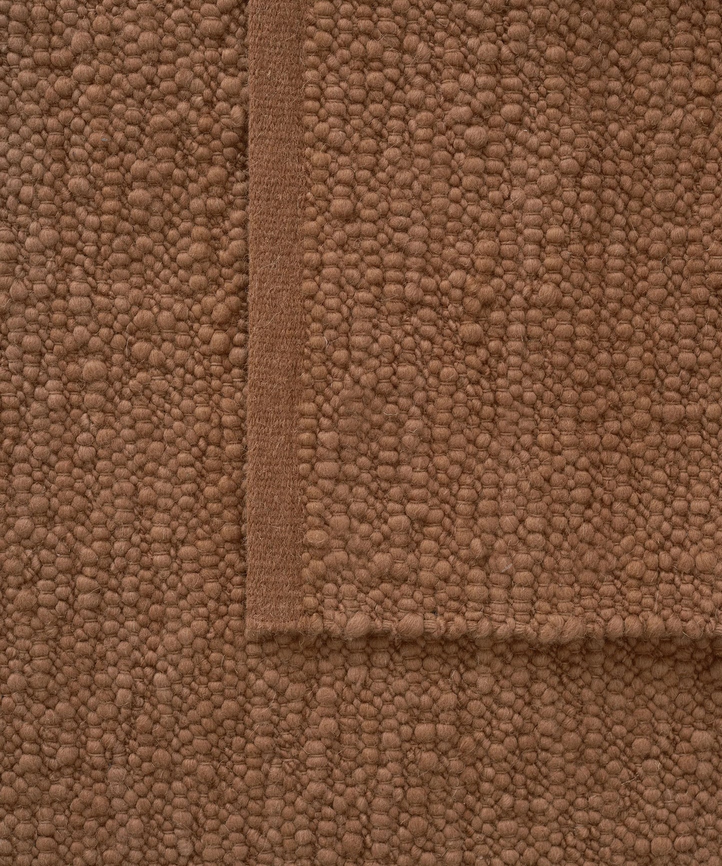 Pebbled Poem Rug in Terracotta