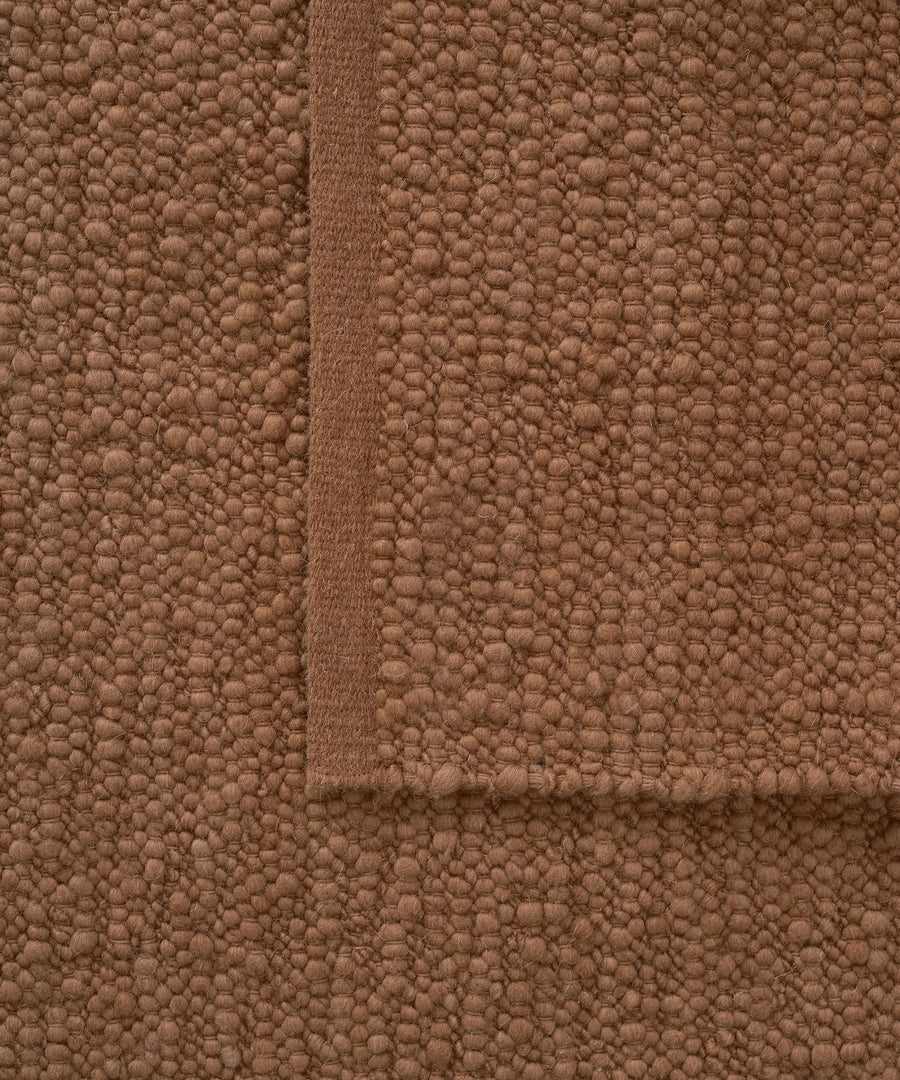 Pebbled Poem Rug in Terracotta