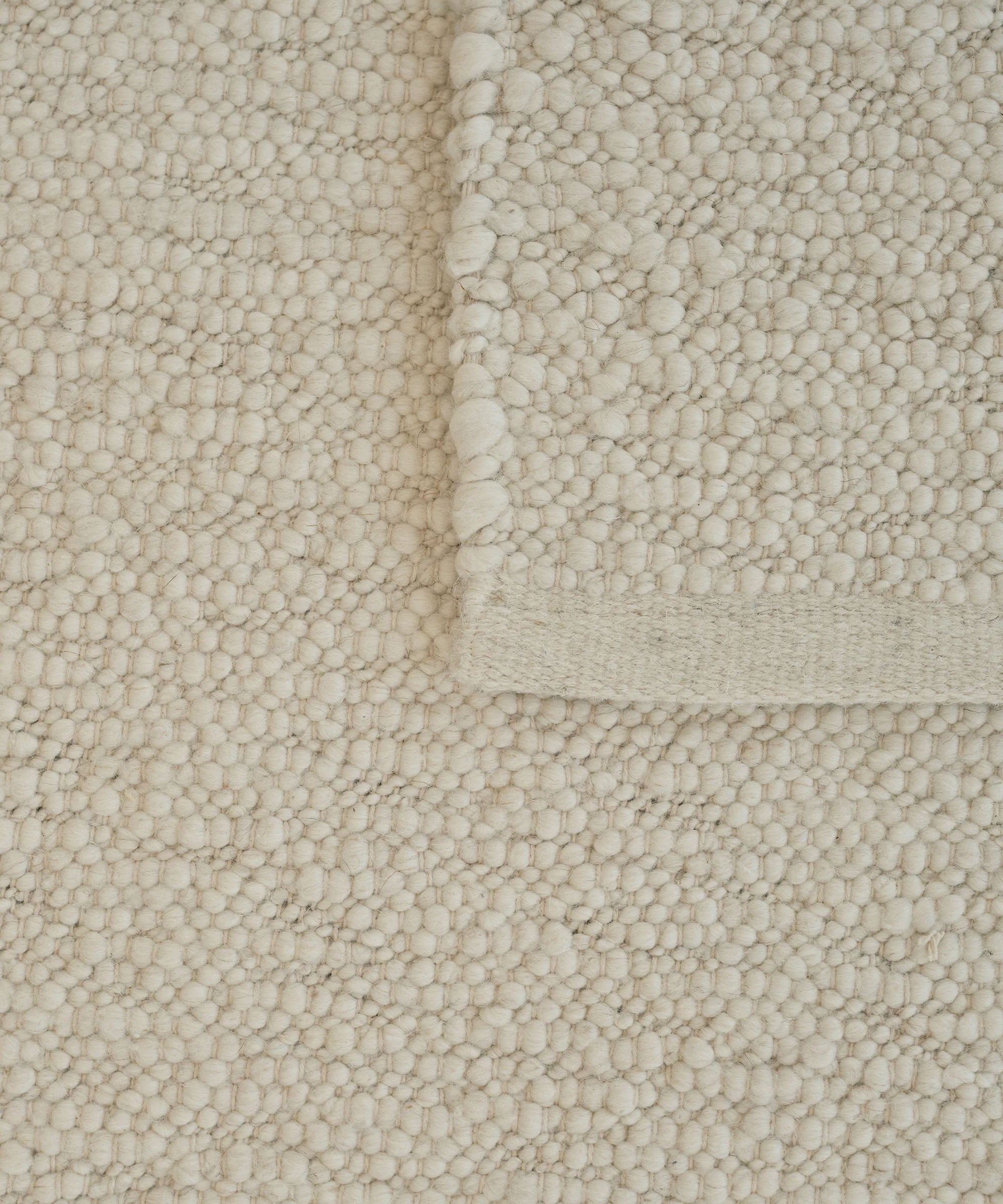 Pebbled Poem Rug in White