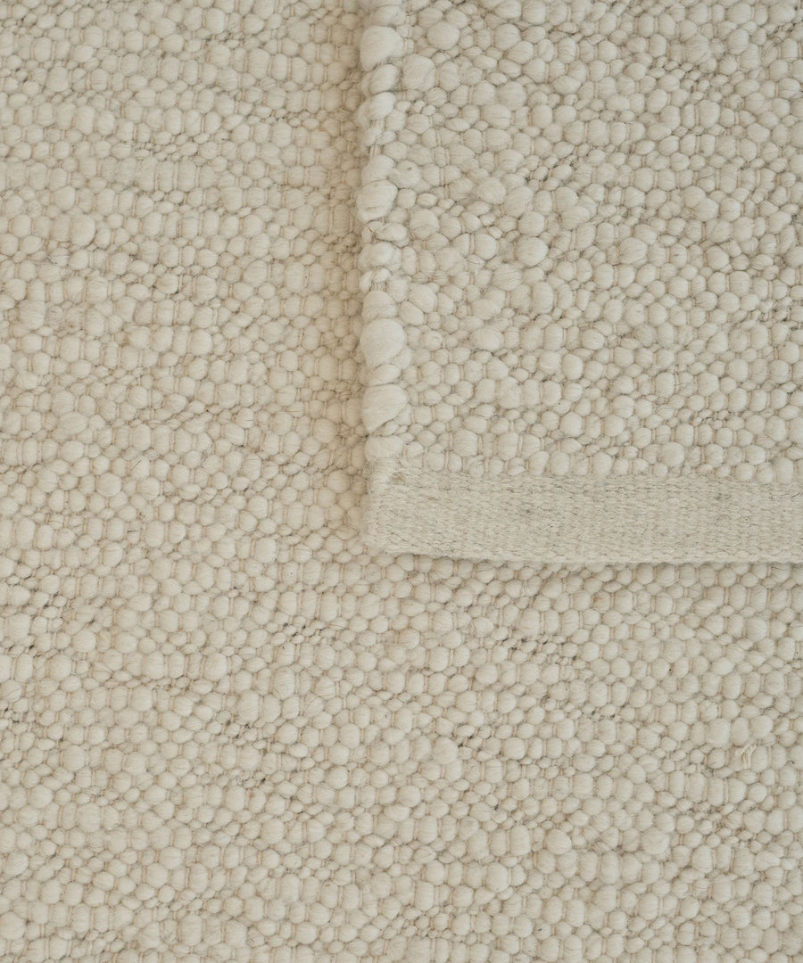 Pebbled Poem Rug in White